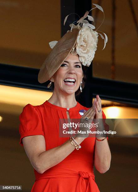 Crown Princess Mary of Denmark watches the racing as she attends day 2 of Royal Ascot at Ascot Racecourse on June 15, 2016 in Ascot, England.