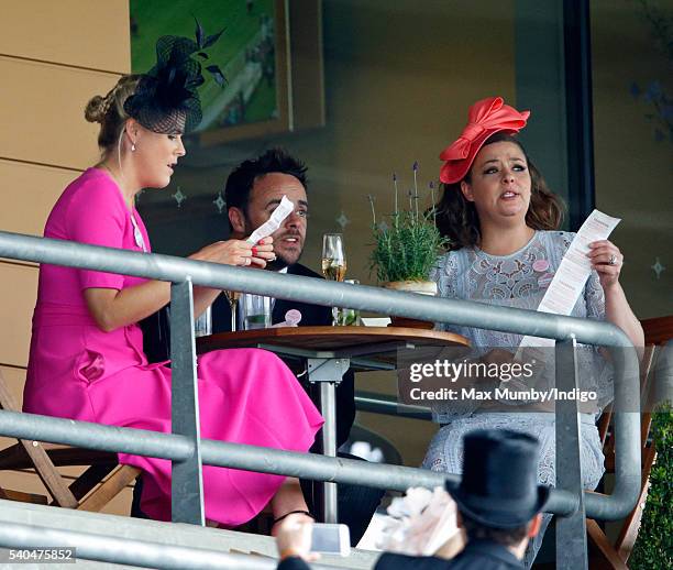 Ali Astall, Anthony McPartlin and Lisa Armstrong watch the racing as they attend day 2 of Royal Ascot at Ascot Racecourse on June 15, 2016 in Ascot,...