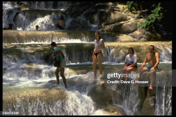 tourists on the dunn's river falls - dunns river falls stock pictures, royalty-free photos & images