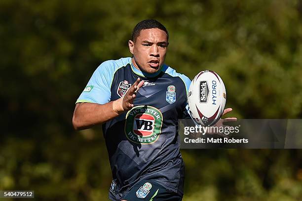 Tyson Frizell receives a pass during a New South Wales Blues State of Origin training session on June 16, 2016 in Coffs Harbour, Australia.