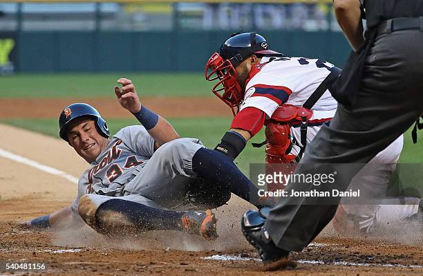 James McCann of the Detroit Tigers is tagged out at the plate by Dioner Navarro of the Chicago White Sox in the 3rd inning at U.S. Cellular Field on...