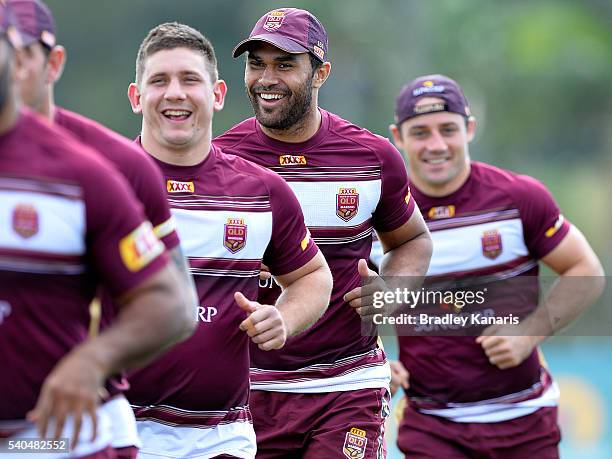 Jacob Lillyman, Justin O'Neill and Cooper Cronk share a laugh during a Queensland Maroons State of Origin training session at Sanctuary Cove on June...