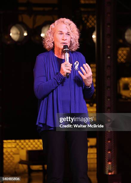 Musician Carole King receives a mayoral proclamation during the curtain call of the 1000th performance of 'Beautiful - The Carole King Musical' at...