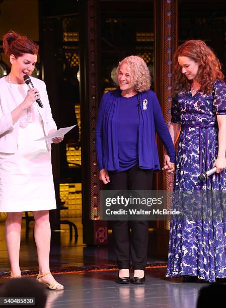 Musician Carole King and Chilina Kennedy receive a mayoral proclamation during the curtain call of the 1000th performance of 'Beautiful - The Carole...