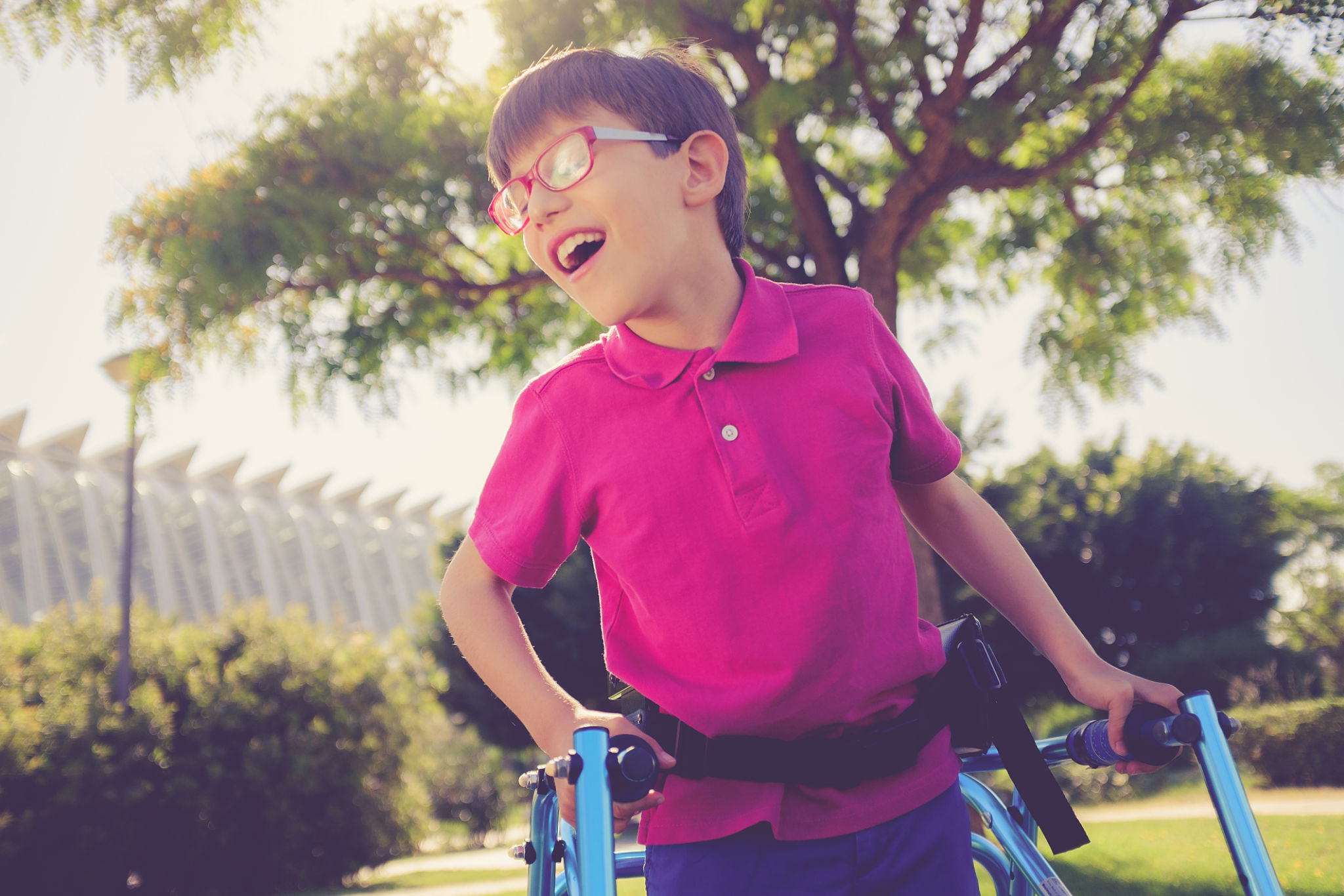 Disability child, walking sticks, cerebral palsy, smiling Disability child, walking sticks, cerebral palsy, smiling