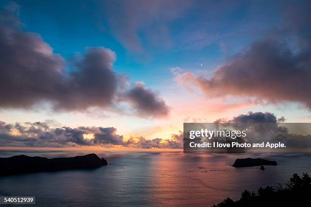 ogasawara sunrise colours - chichijima stock pictures, royalty-free photos & images