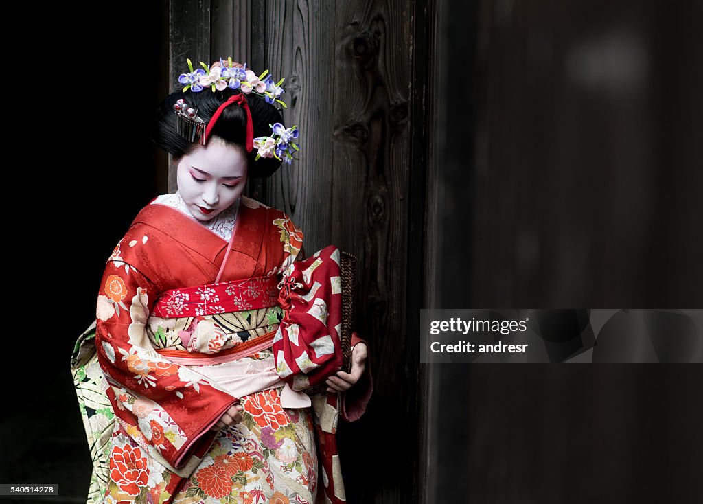 Geisha wearing a beautiful kimono