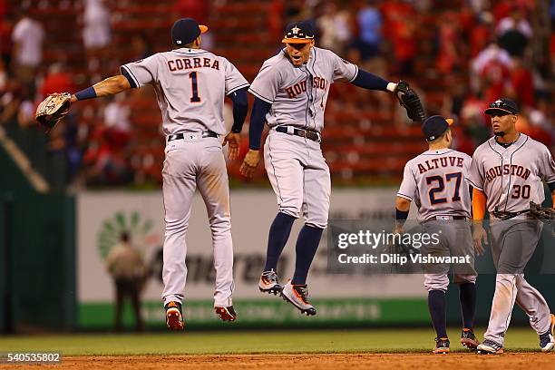 Carlos Correa and George Springer of the Houston Astros celebrate after beating the St. Louis Cardinals at Busch Stadium on June 15, 2016 in St....