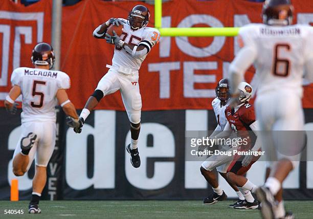 Willie Pile of the Virginia Tech Hokies goes up to make an interception against the Temple Owls as the Hokies defeated the Owls 35-0 in Big East NCAA...