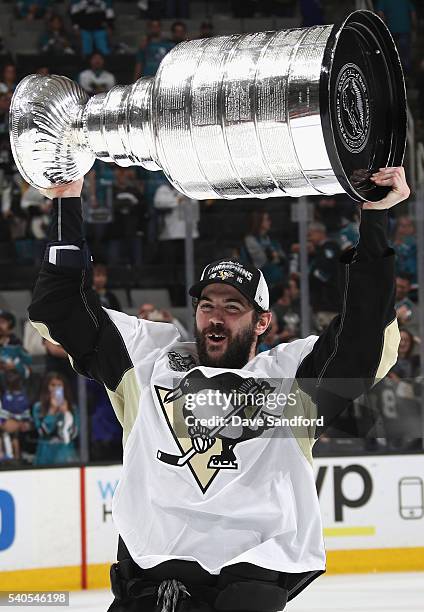 Justin Schultz of the Pittsburgh Penguins celebrates with the Stanley Cup after the Penguins won Game 6 of the 2016 NHL Stanley Cup Final over the...