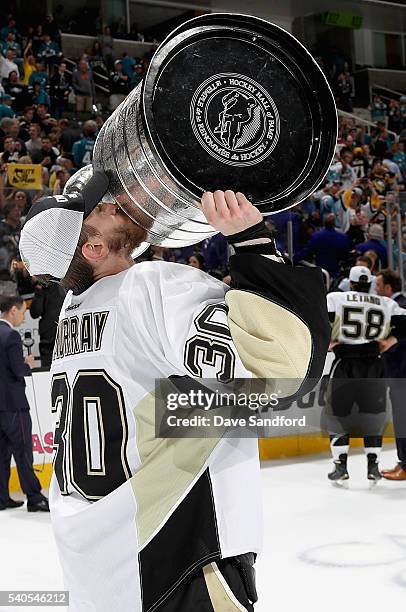 Goaltender Matt Murray of the Pittsburgh Penguins kisses the Stanley Cup after the Penguins won Game 6 of the 2016 NHL Stanley Cup Final over the San...