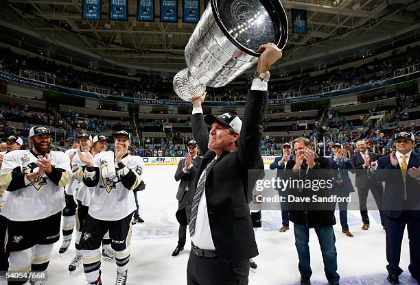 Head coach Mike Sullivan of the Pittsburgh Penguins celebrates with the Stanley Cup after the Penguins won Game 6 of the 2016 NHL Stanley Cup Final...