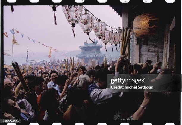 crowd carrying incense to temple - hong kong celebrates the tin hau festival stock pictures, royalty-free photos & images