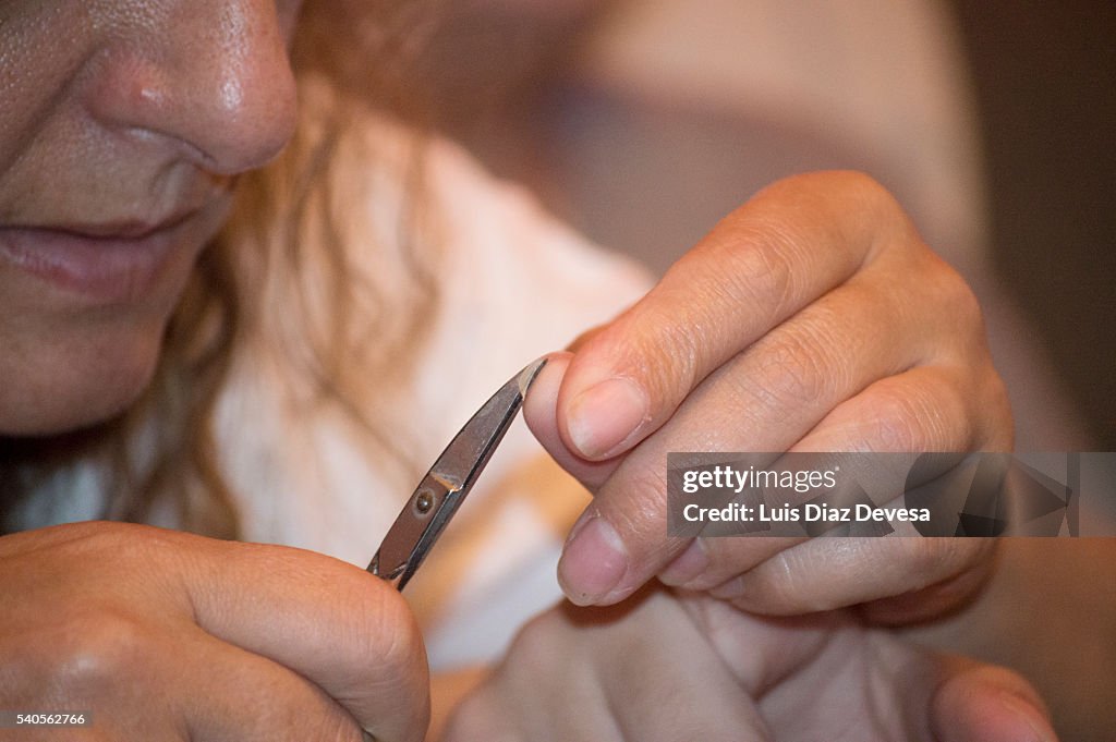 Mother clipping fingernails