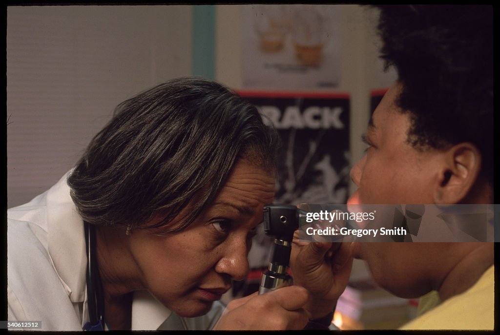 Woman Receiving Physical At Clinic