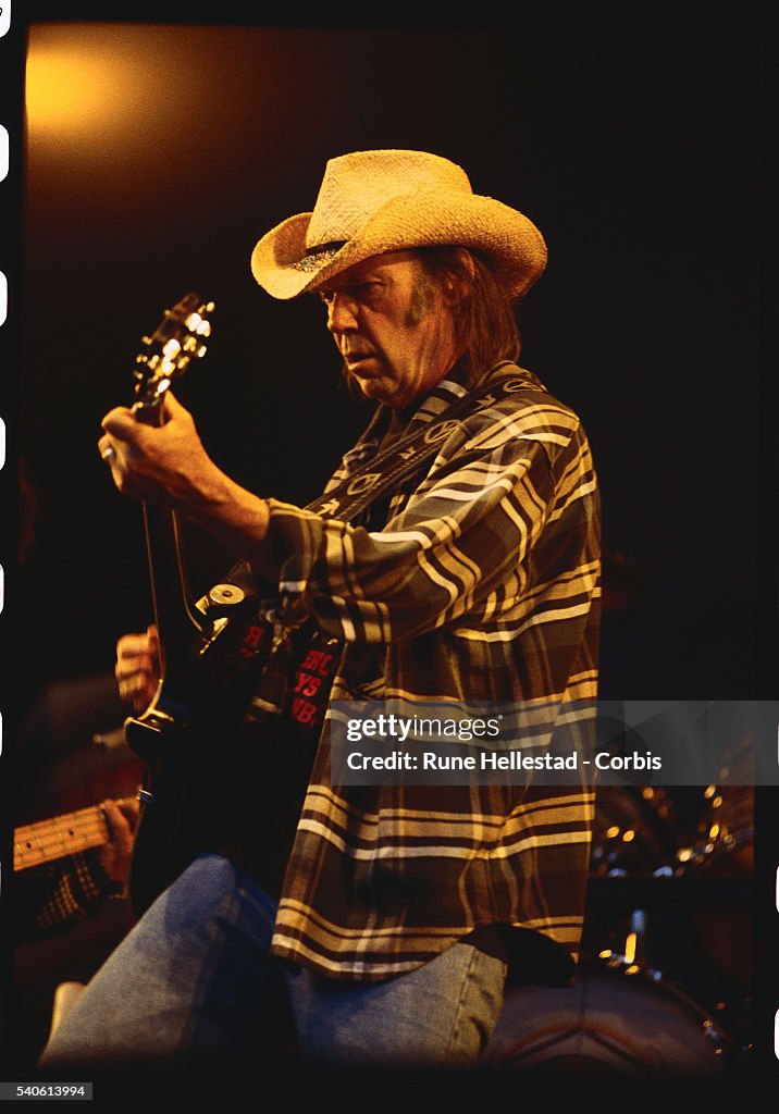 Neil Young Performing on Stage