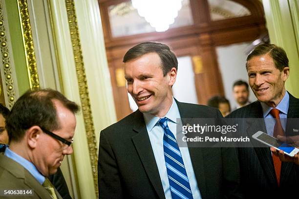 Senator Richard Blumenthal , , looks on as Senator Chris Murphy speaks to reporters after waging an almost 15-hour filibuster on the Senate floor in...