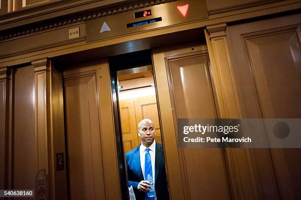 Senator Cory Booker leaves in an elevator after assisting Senator Chris Murphy in waging an almost 15-hour filibuster on the Senate floor in order to...