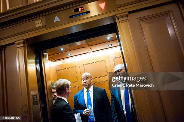 Senator Cory Booker leaves in an elevator after assisting Senator Chris Murphy in waging an almost 15-hour filibuster on the Senate floor in order to...