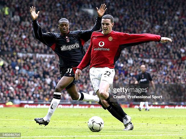 John O'Shea of Manchester United fends off Osei Sankofa of Charlton Athletic during the FA Barclaycard Premiership match between Manchester United...