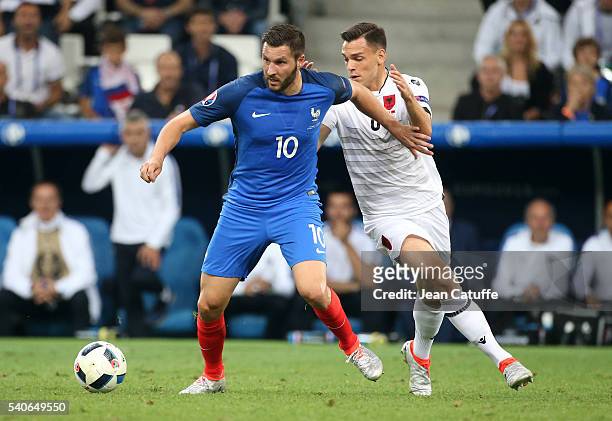 Andre-Pierre Gignac of France and Frederic Veseli of Albania in action during the UEFA EURO 2016 Group A match between France and Albania at Stade...