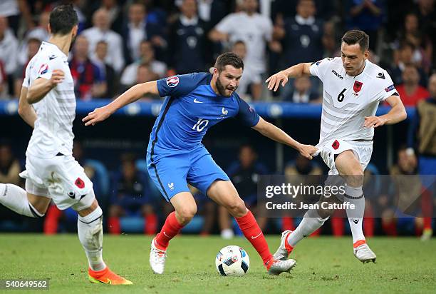 Andre-Pierre Gignac of France and Frederic Veseli of Albania in action during the UEFA EURO 2016 Group A match between France and Albania at Stade...