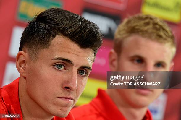 Austria's midfielder Alessandro Schoepf and Austria's defender Martin Hinteregger hold a press conference at their training ground in Mallemort,...