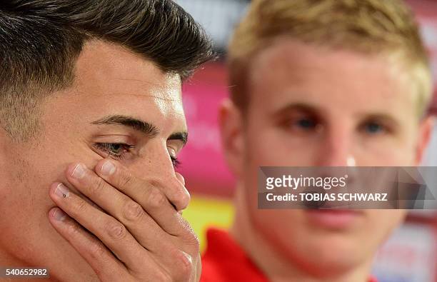 Austria's midfielder Alessandro Schoepf and Austria's defender Martin Hinteregger hold a press conference at their training ground in Mallemort,...