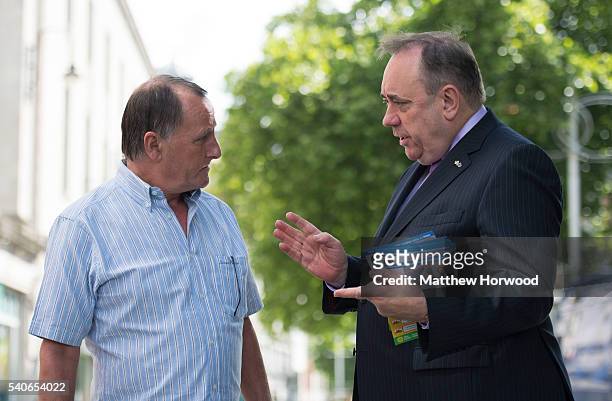 First Minister of Scotland Alex Salmond MP speaks to a member of the public during a rally at the Aneurin Bevan Statue on Queen Street as they make a...