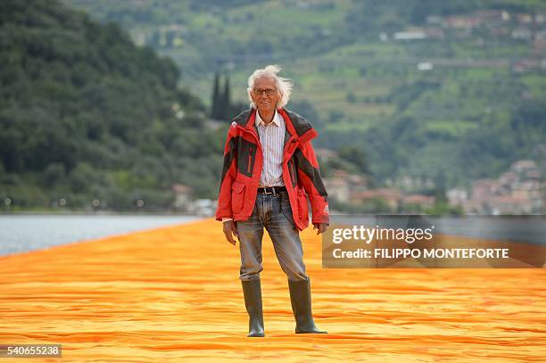 Artist Christo Vladimirov Javacheff walks on his monumental installation "The Floating Piers" he created with late Jeanne-Claude, on June 16, 2016...