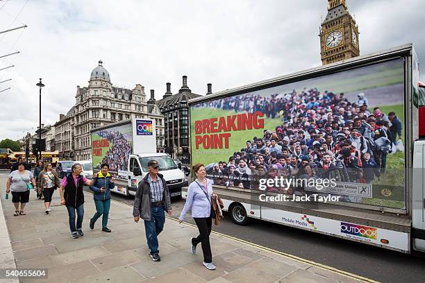 Vans displaying the United Kingdom Independence Party's new EU referendum campaign poster are driven around Parliament Square on June 16, 2016 in...