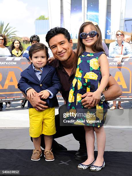 Dominic Lopez, Mario Lopez and Gia Francesca Lopez pose together at "Extra" at Universal Studios Hollywood on June 15, 2016 in Universal City,...