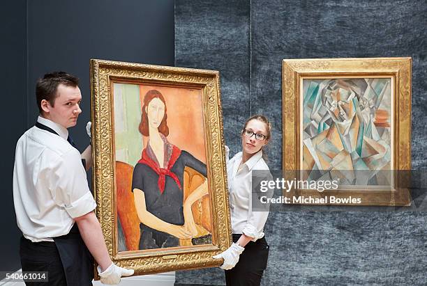 Masterpieces by Modigliani and Picasso unveiled at Sotheby's on June 16, 2016 in London, England. Modigliani's Jeanne Hebuterne , 1919 and Picasso's...