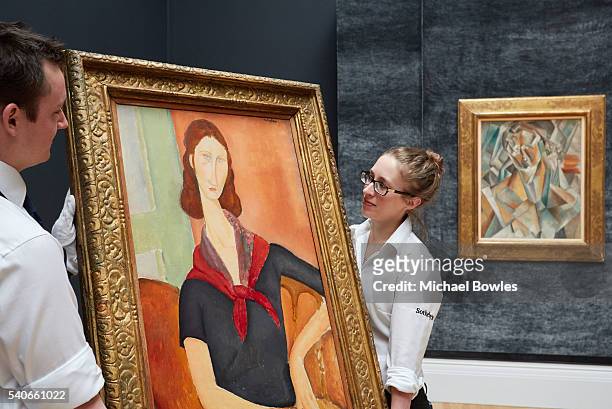 Masterpieces by Modigliani and Picasso unveiled at Sotheby's on June 16, 2016 in London, England. Modigliani's Jeanne Hebuterne , 1919 and Picasso's...