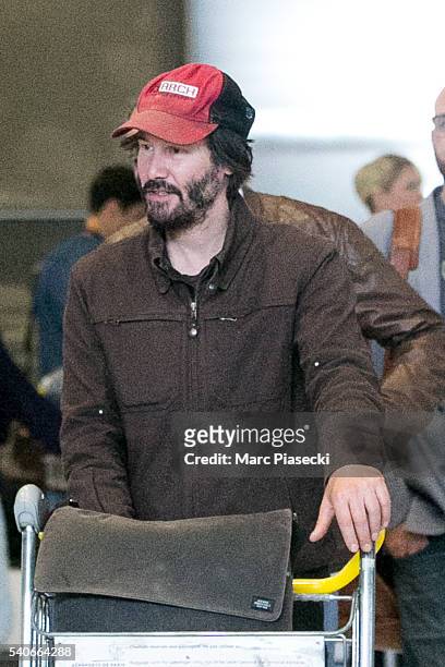 Actor Keanu Reeves arrives at Charles-de-Gaulle airport on June 16, 2016 in Paris, France.