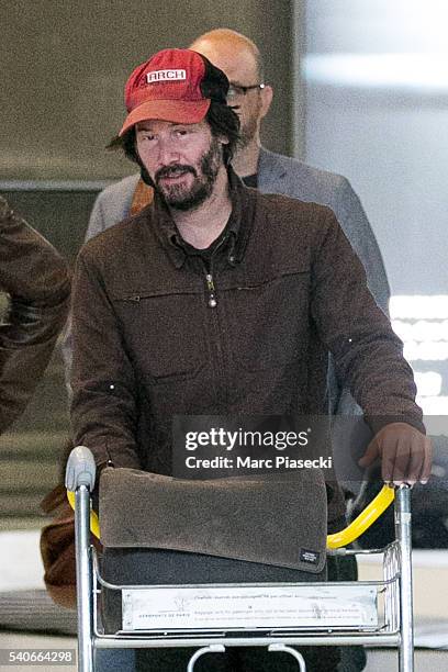 Actor Keanu Reeves arrives at Charles-de-Gaulle airport on June 16, 2016 in Paris, France.