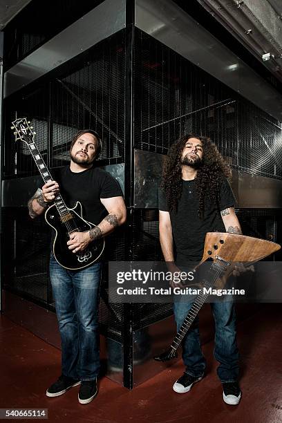 Portrait of American musicians Claudio Sanchez and Travis Stever of progressive rock group Coheed And Cambria, photographed at SW19 Studios in London...