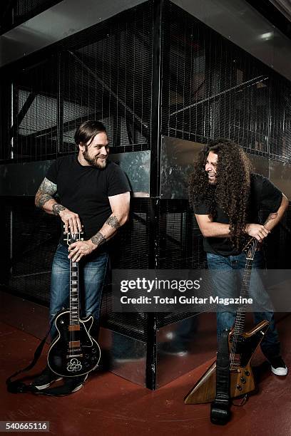 Portrait of American musicians Claudio Sanchez and Travis Stever of progressive rock group Coheed And Cambria, photographed at SW19 Studios in London...
