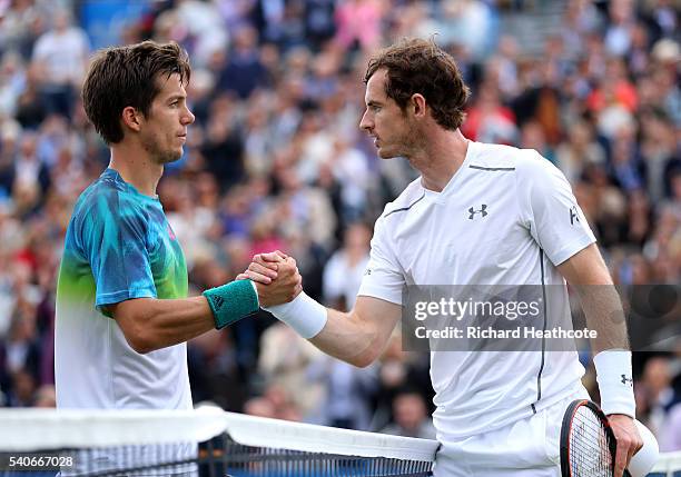 Andy Murray shakes hands with Aljaz Bedene after winning their second round match during day four of The Aegon Championships at The Queens Club on...