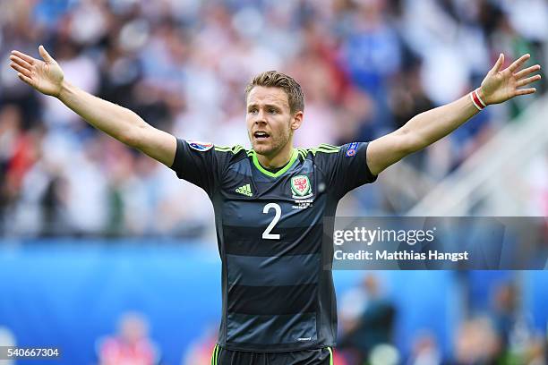 Chris Gunter of Wales protests after England's first goal during the UEFA EURO 2016 Group B match between England and Wales at Stade Bollaert-Delelis...
