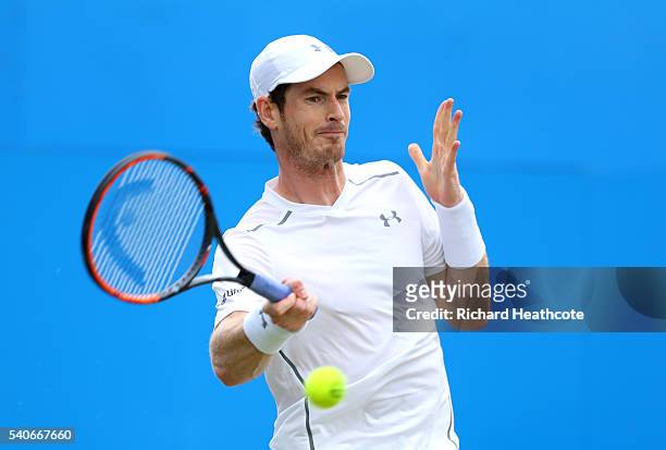 Andy Murray returns against Aljaz Bedene during their second round match on day four of The Aegon Championships at The Queens Club on June 16, 2016...