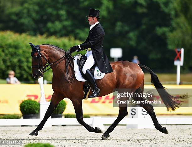 Joseph Murphy of Ireland riding Sportsfield Othello takes part in the dressage section of the German Championships on June 16, 2016 in Luhmuhlen,...