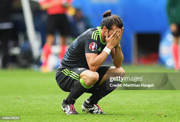 Gareth Bale of Wales shows his dejection after England's second goal during the UEFA EURO 2016 Group B match between England and Wales at Stade...