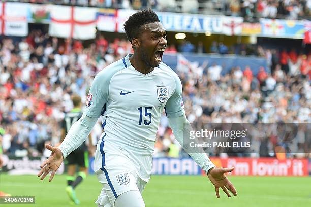 England's forward Daniel Sturridge celebrates scoring the 2-1 goal during the Euro 2016 group B football match between England and Wales at the...