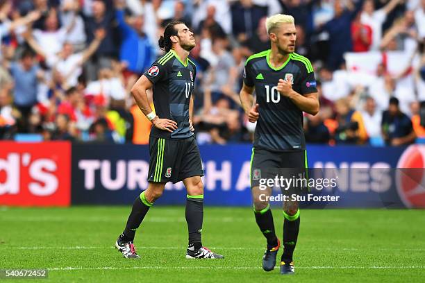 Gareth Bale and Aaron Ramsey of Wales show dejection after England's second goal in the UEFA EURO 2016 Group B match between England and Wales at...