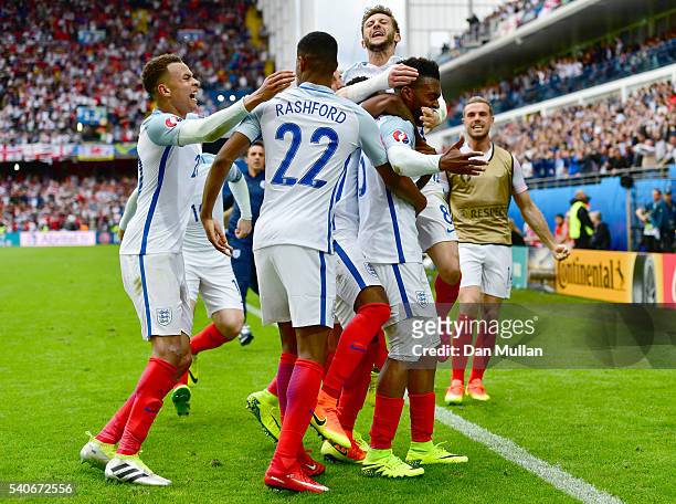 Daniel Sturridge of England with Danny Rose celebrates scoring his team's second goal with his team matesduring the UEFA EURO 2016 Group B match...