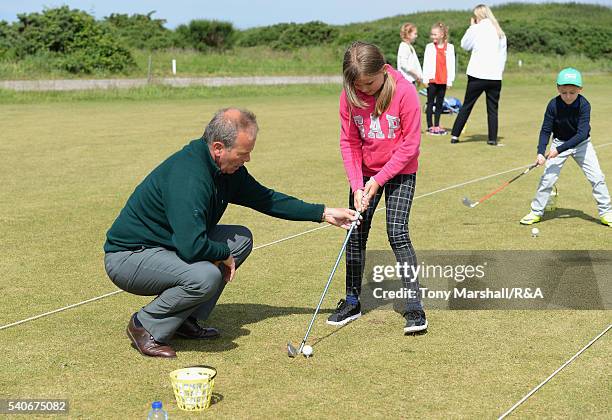 Young players take part in the junior golf clinic during The Amateur Championship 2016 - Day Four at Royal Porthcawl Golf Club on June 16, 2016 in...