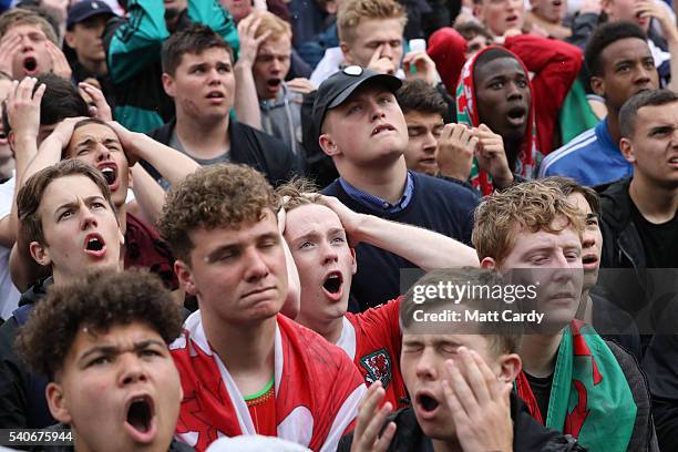 Welsh fans react at the end of the UEFA EURO 2016 Group B match between England and Wales on June 16, 2016 in Cardiff, Wales. Having beaten Slovakia...