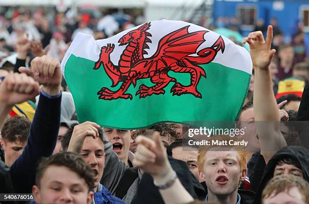 Welsh fans gather to watch the UEFA EURO 2016 Group B match between England and Wales on June 16, 2016 in Cardiff, Wales. Having beaten Slovakia in...