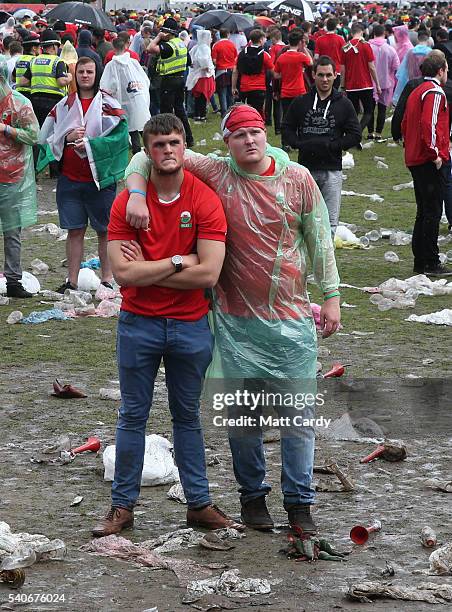 Welsh fans react at the end of the UEFA EURO 2016 Group B match between England and Wales on June 16, 2016 in Cardiff, Wales. Having beaten Slovakia...